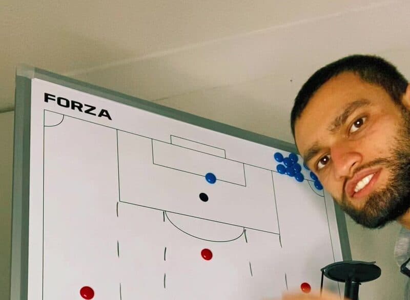 Coach Rafaz at the tactics board in his studio.